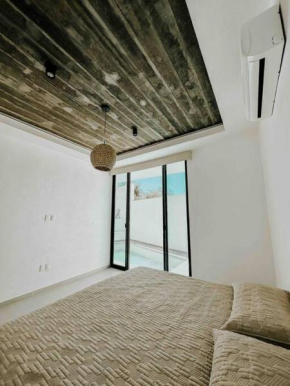 Casa Calec: Dpto A. nuevo con piscina